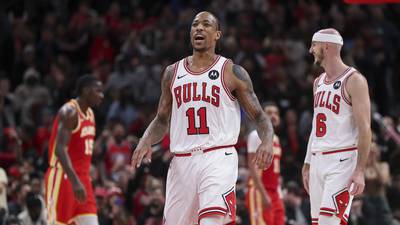 Photos: Bulls beat Hawks 118-113