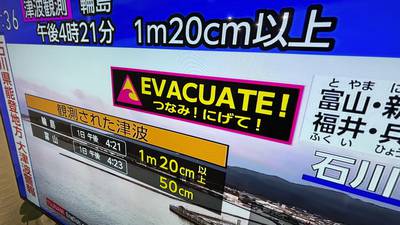 Japan issues tsunami warnings after a series of very strong earthquakes shook its western coastline