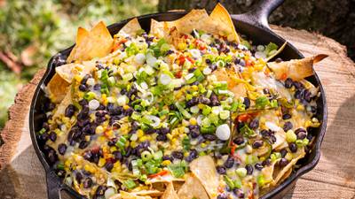 America’s Test Kitchen: This cheesy, smoky plate of nachos will brighten up any cookout