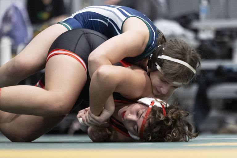 Girls wrestling is Illinois’ fastest growing high school sport. But equity remains elusive for some, parents say.